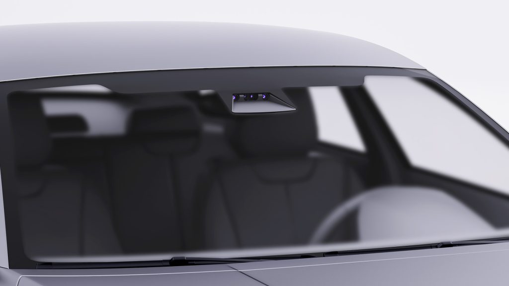 Windshield-mounted forward-facing ADAS camera requiring professional recalibration after windshield replacement to ensure accurate driver assistance system performance