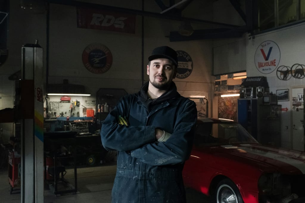 a technician is doing mobile auto glass repair
