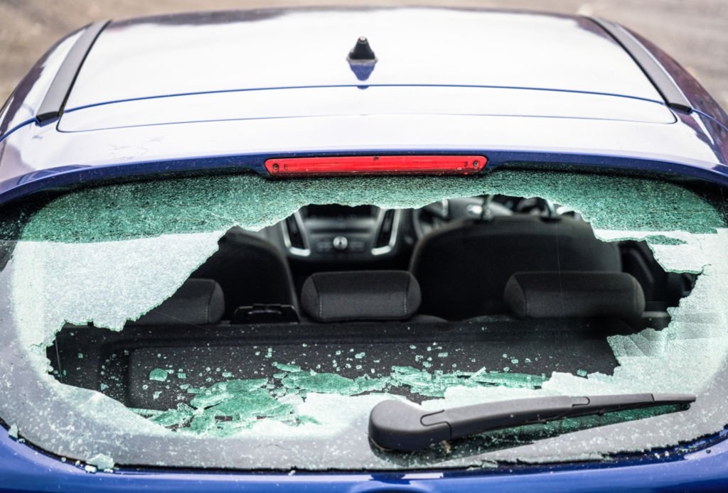 Car rear window smashed by thief
