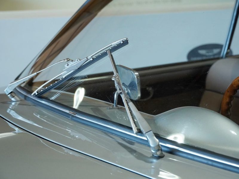 A close-up of a freshly replaced front car windshield